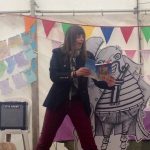 Emma Purshopuse reads to Figment from their book %22I Once Knew a Poem who Wore a Hat%22